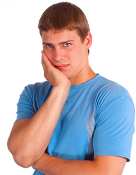 Man grabbing his jaw in pain